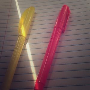 Pink and yellow Highlighters.